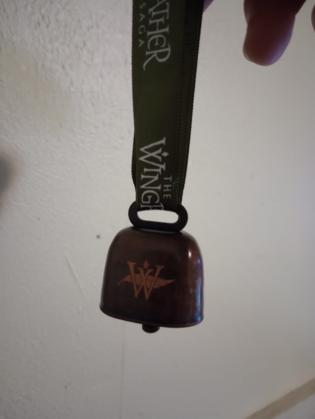 Customer photo review of Toothy Cow Bell Christmas Ornament