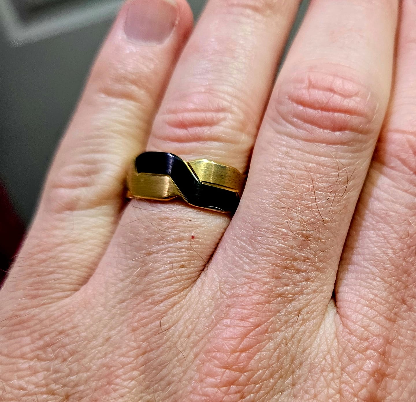 Customer photo review of Tungsten Black and Gold Infinity Knot Ring, Tungsten Rings for Men Wedding Band