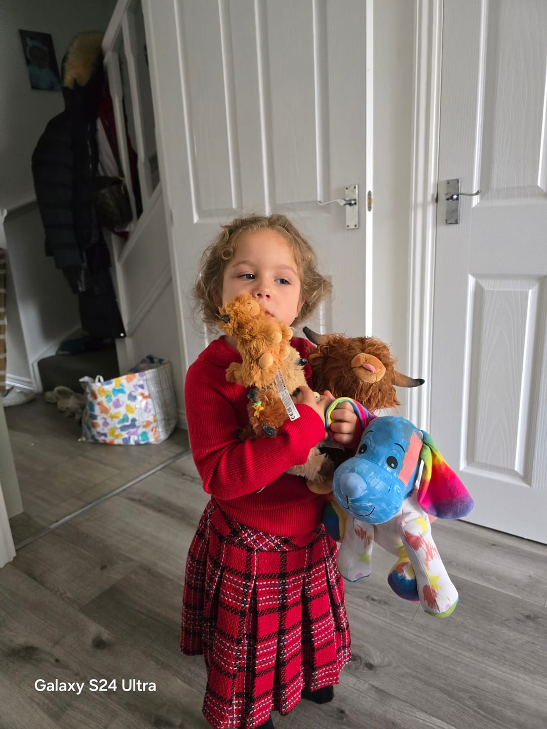 Customer photo review of Scottish Highland Cow Cattle Stuffed Animal with 4 Babies Inside