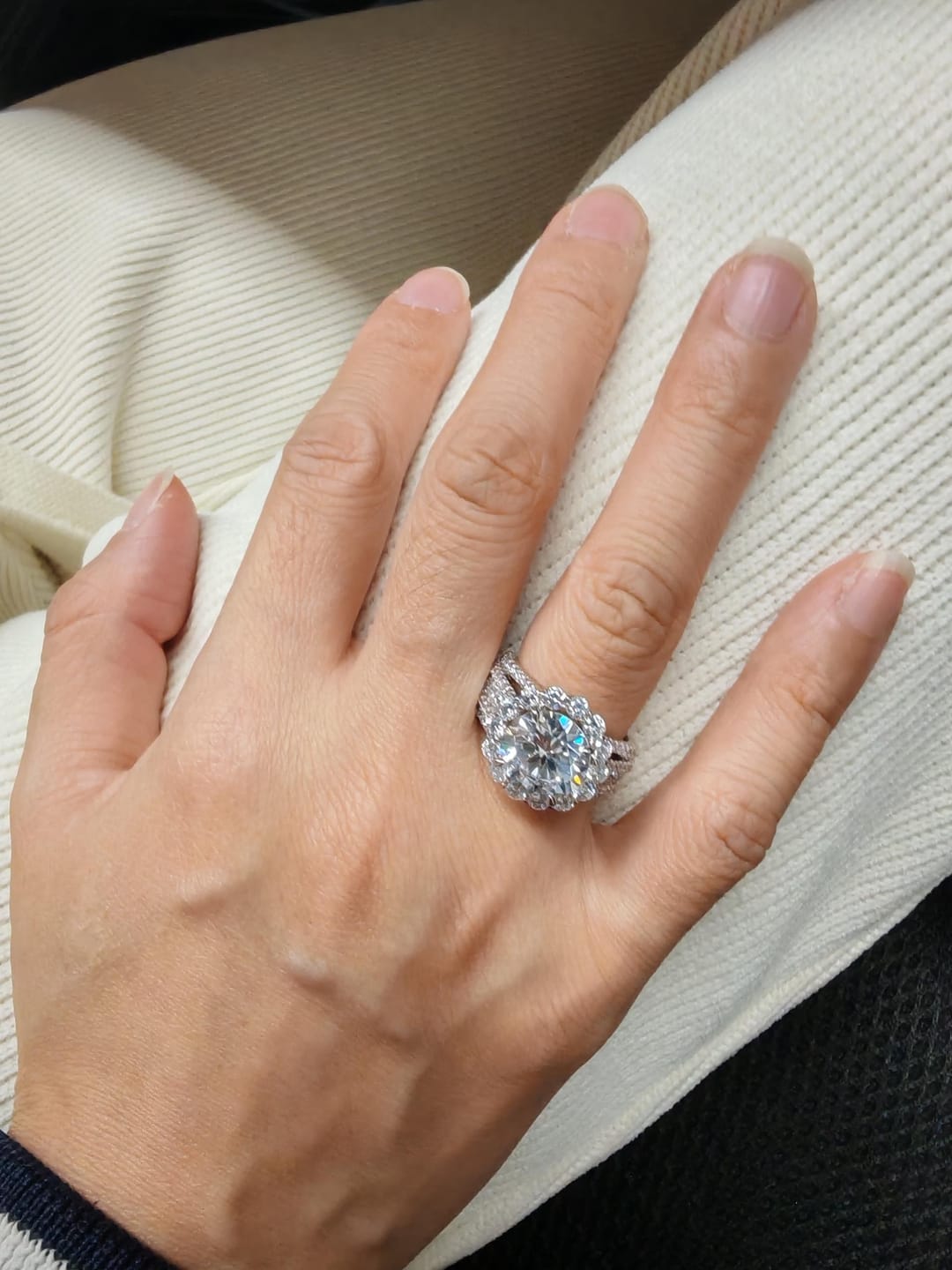 Customer photo review of Louily Unique Halo Design Round Cut Engagement Ring In Sterling Silver