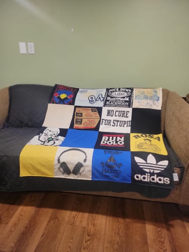 T-shirt quilt with music, sports themes by Marilyn from MA