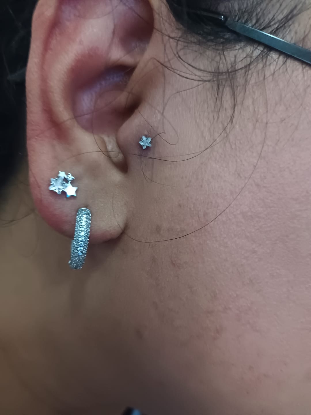 Customer photo review of Piercing Estrellas Rosca Plana