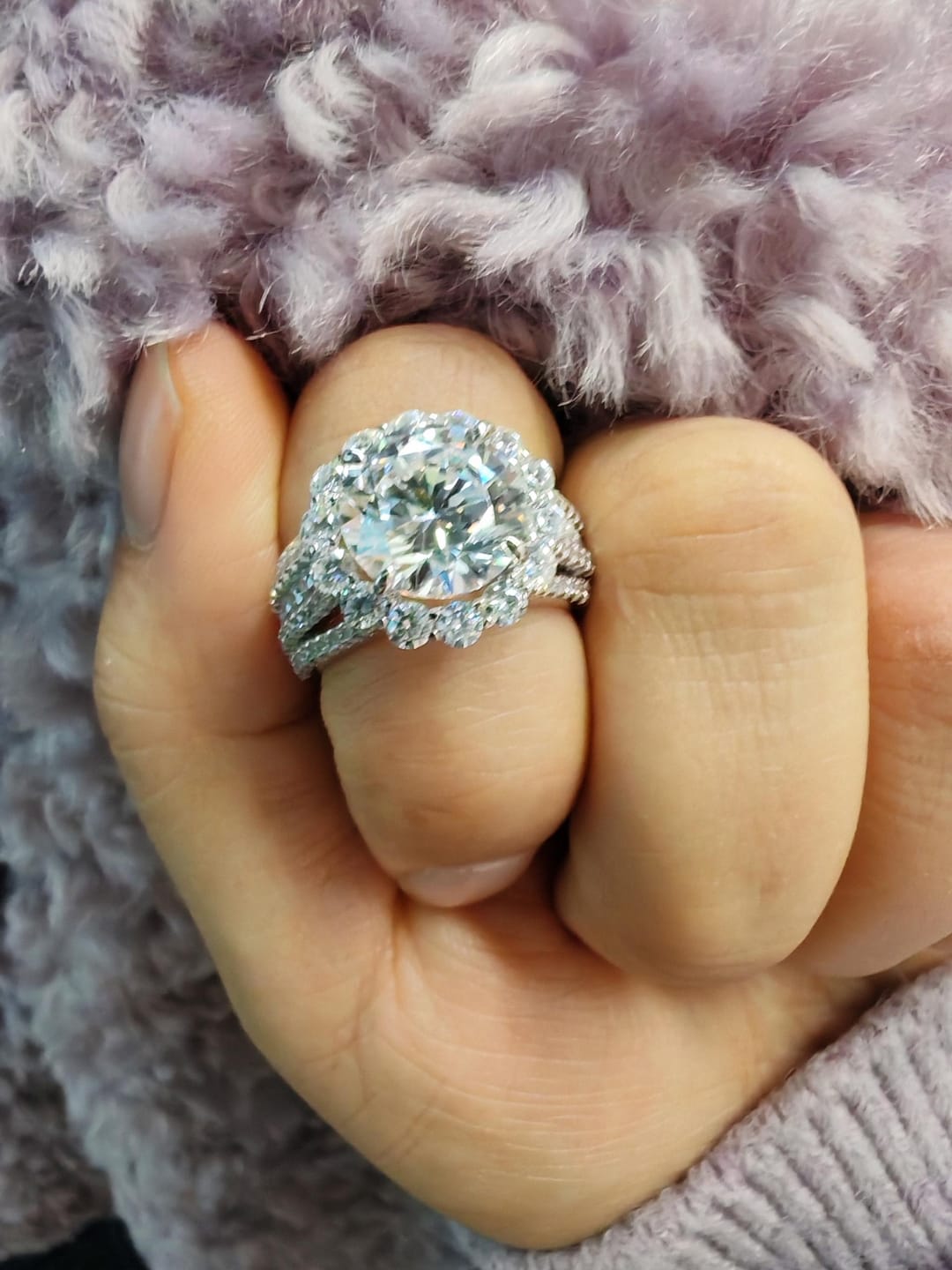 Customer photo review of Louily Unique Halo Design Round Cut Engagement Ring In Sterling Silver
