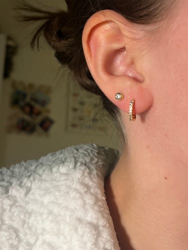 Customer photo review of Evie Pink Gold Huggie Earrings