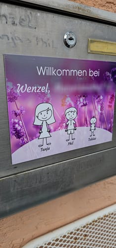 Customer photo review of Familien Türschild (UV- und wetterfest)
