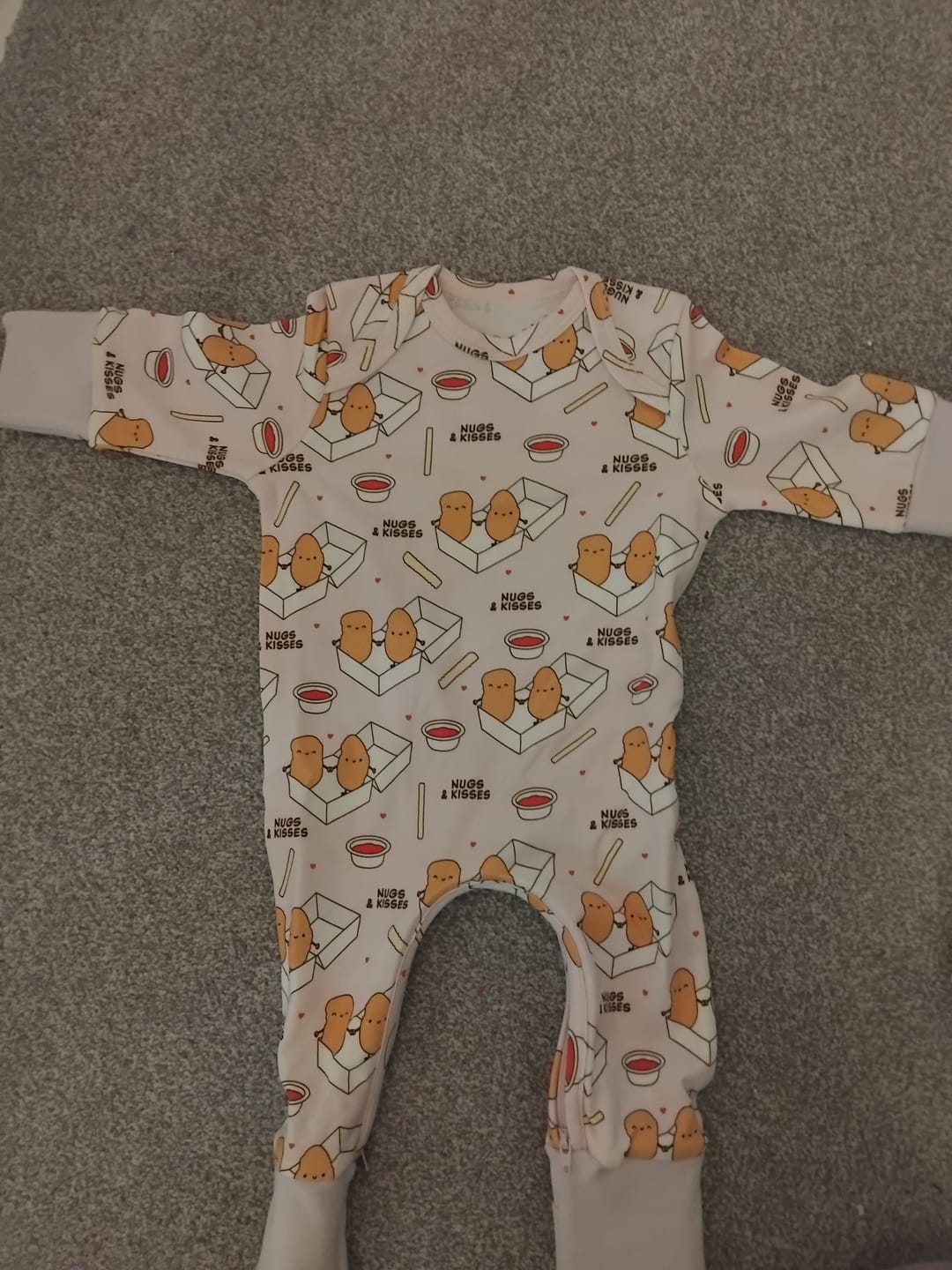 Customer photo review of Nugs & Kisses Onesie