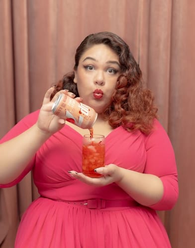 Customer photo review of Starlet Swing Dress in Fuchsia - Vixen by Micheline Pitt