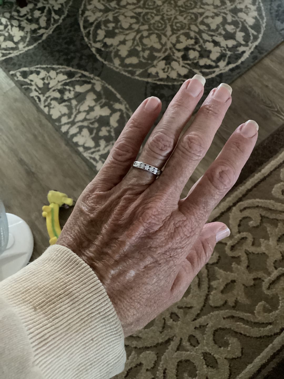 Customer photo review of Channel Set Moissanite Half Eternity Wedding Band Ring In Sterling Silver