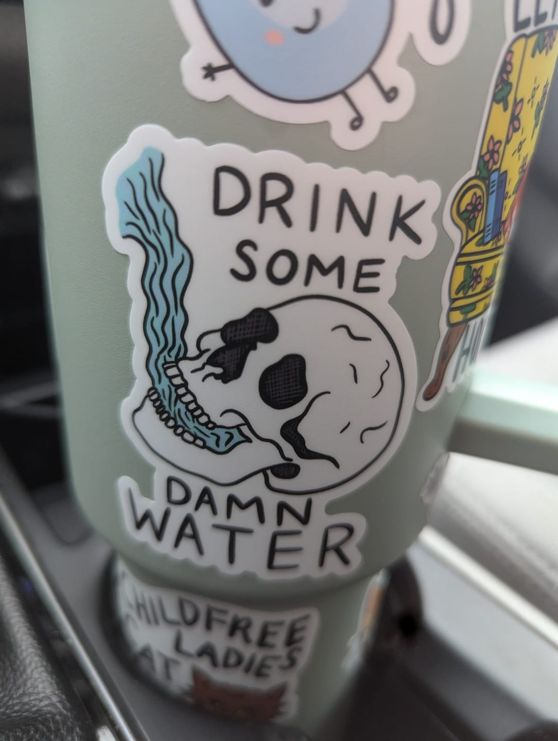 Customer photo review of "Drink some damn water" skull sticker