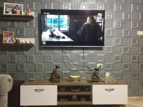 Customer photo review of Meuble TV AYDEN 180cm - Noyer et Blanc