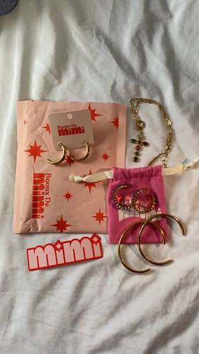 Customer photo review of Phoebe Rainbow Gold Cross Pendant Charm