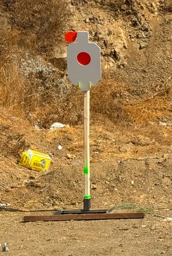 Customer photo review of AR500 Steel Hostage Target 12" x 20" x 1/2" Armored Steel Bullseye Reactive Target with 2X4 & T-Post Bracket