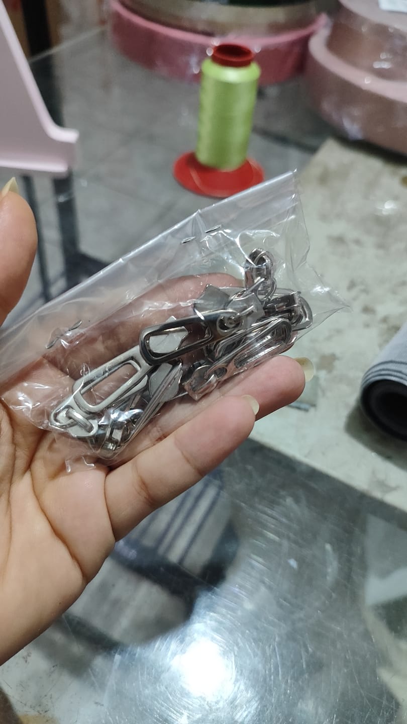 Customer photo review of PUXADOR VAZADO N°6 C/CARRINHO NIQUELADO 10 PEÇAS