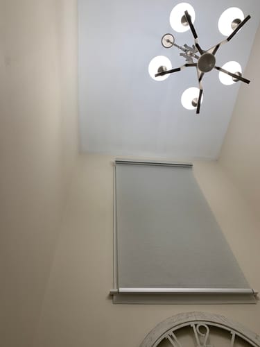 Customer photo review of SmartWings Motorized Light Filtering Roller Shades 70% Blackout Safari
