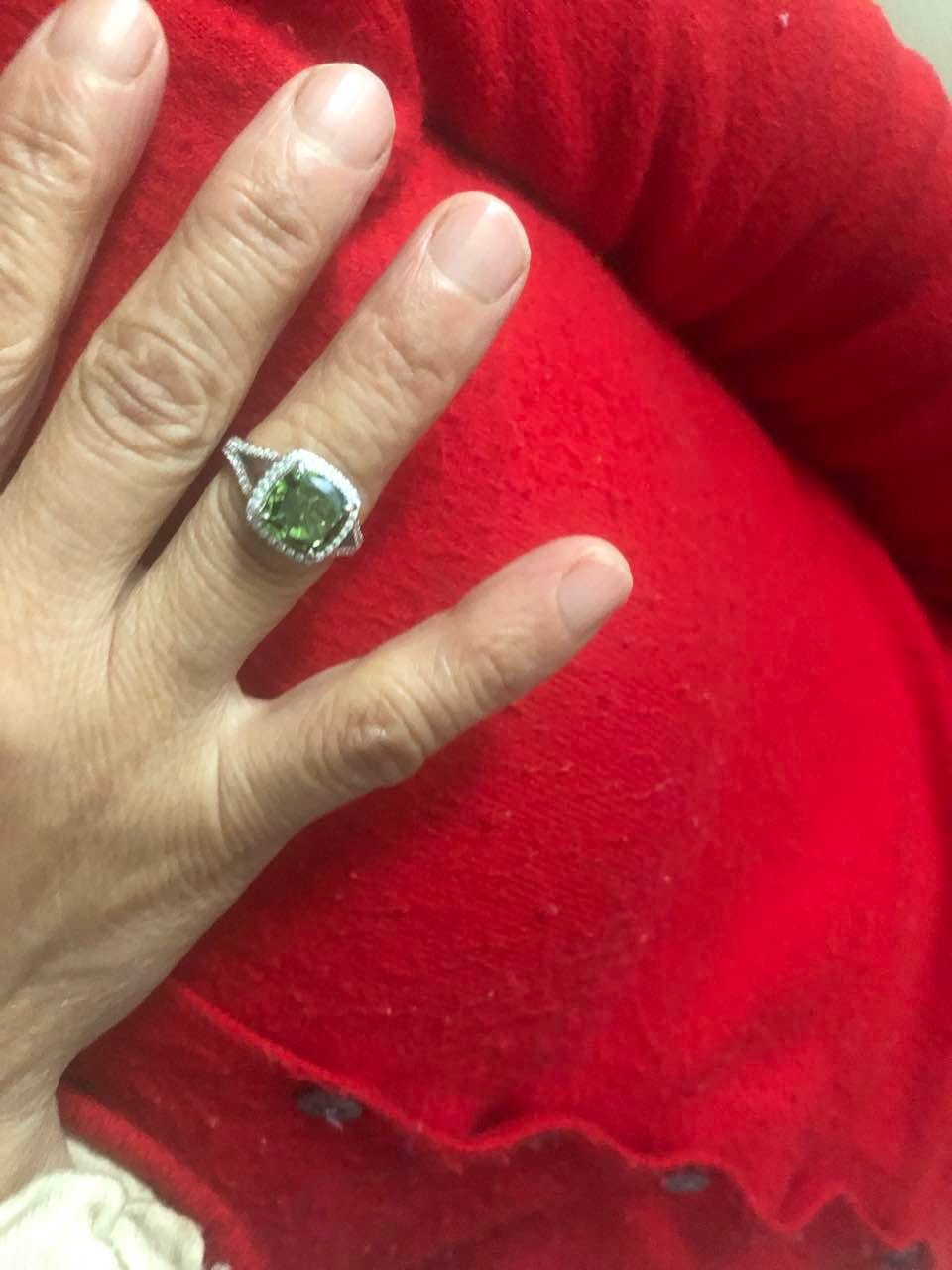 Customer photo review of Louily Vintage Green Stone Split Shank Cushion Cut Engagement Ring