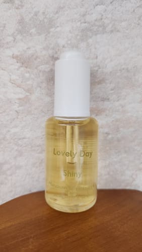 Customer photo review of Shiny Hair Serum
