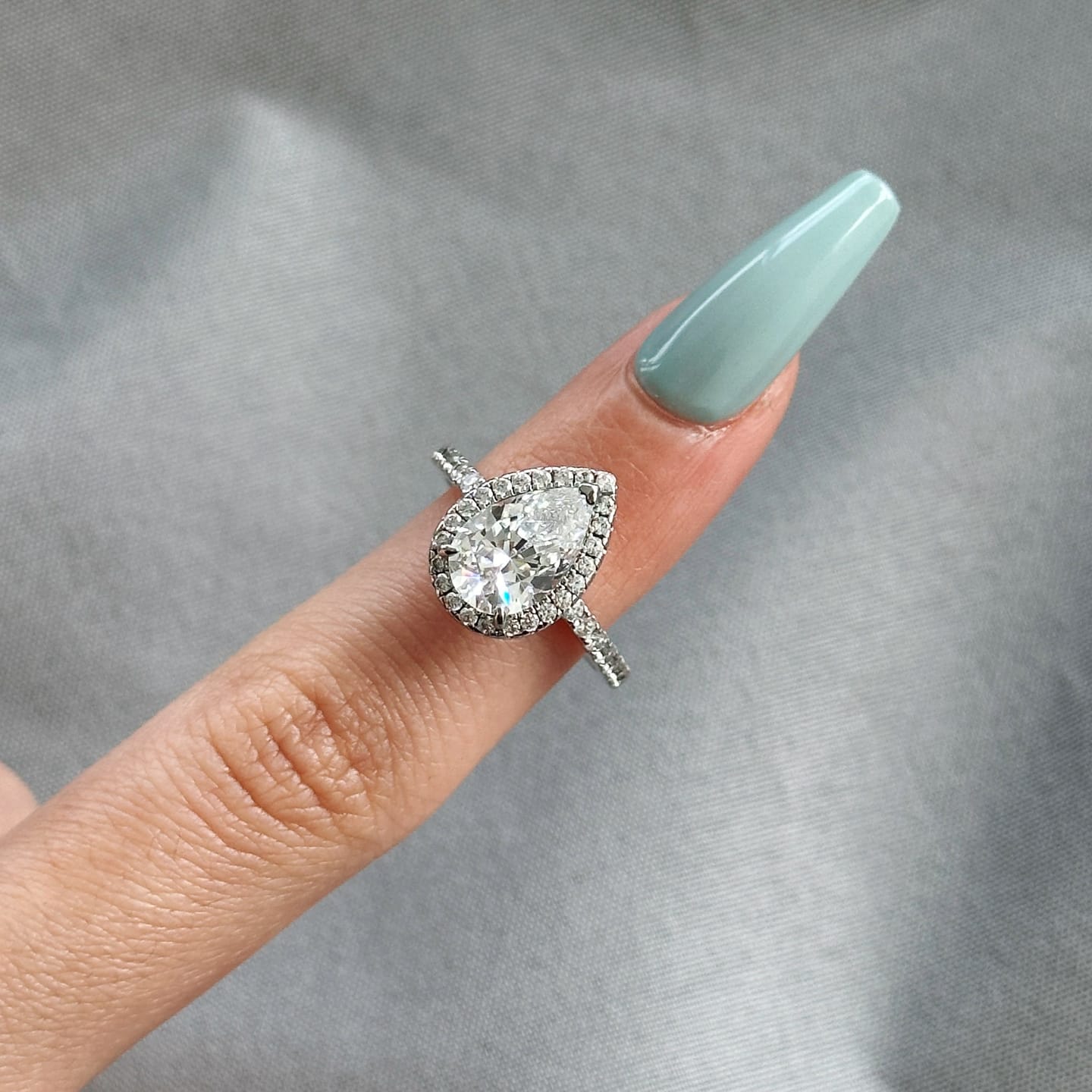 Customer photo review of S925 Moissanite 2.5 Carat Halo Pear Cut Engagement Ring