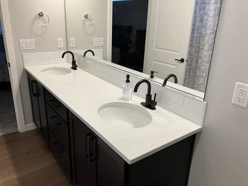 Customer photo review of 1 Hole 1-Handle High Bathroom Faucet with Swivel Spout Black
