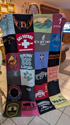 T-shirt quilt with outdoor activities, skiing themes by Cynthia from OH