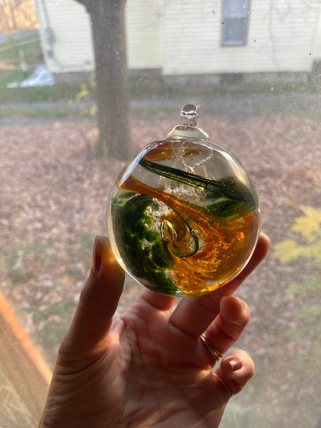 Customer photo review of Glimmer Orb with Cremation Ashes