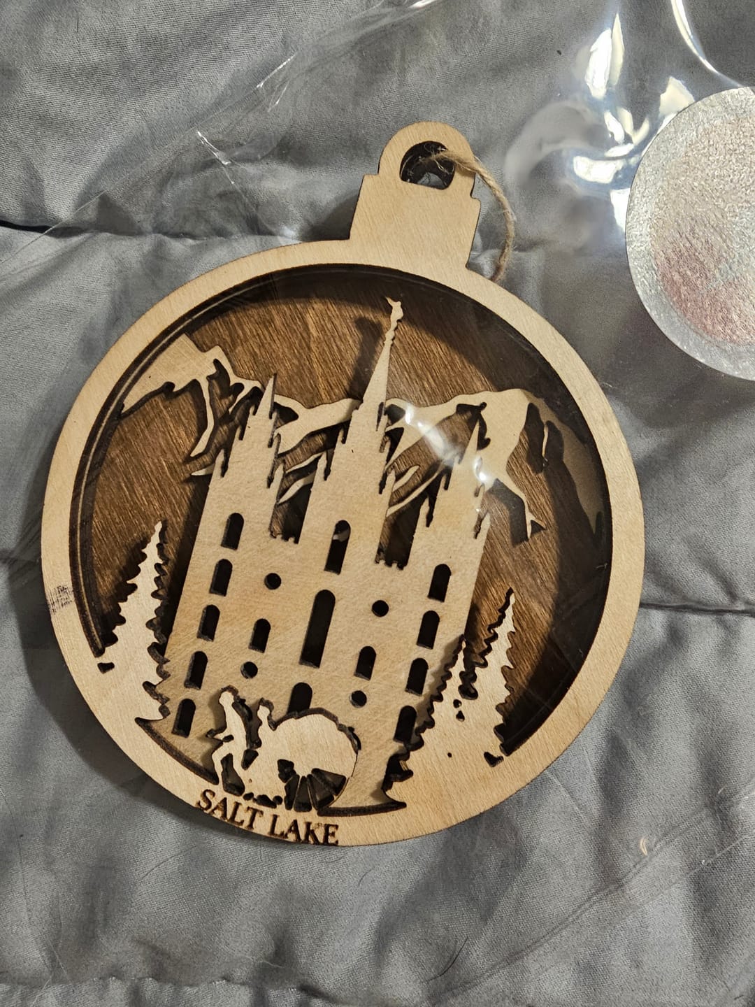 Customer photo review of Wooden Salt Lake Pioneer Christmas 4-Layer Ornament