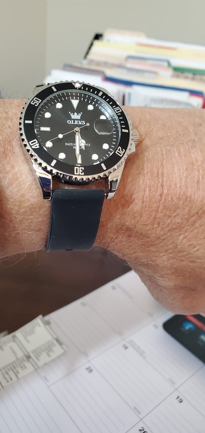 Customer photo review of OLEVS - Dapp