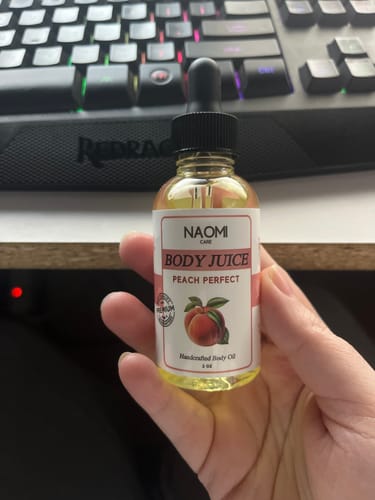 Customer photo review of BOGO Naomi Body Juice Oil