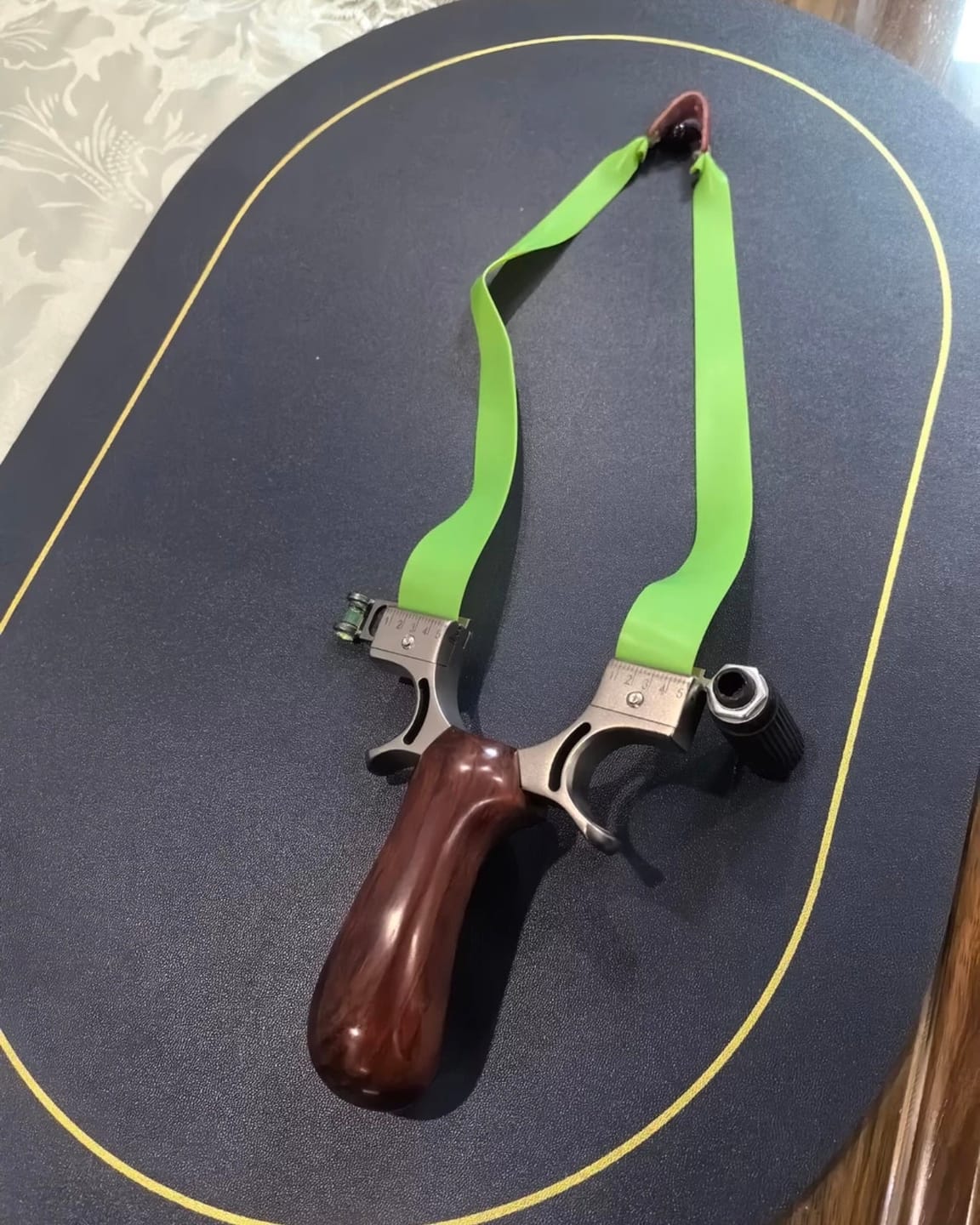 Customer photo review of Stainless Steel Wooden Handle Laser Slingshot