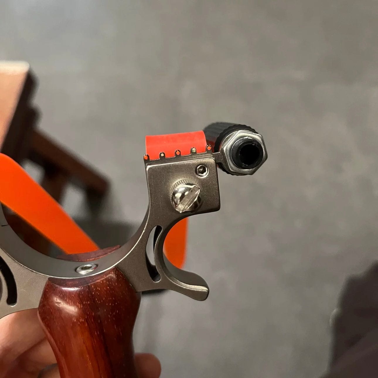 Customer photo review of Stainless Steel Wooden Handle Laser Slingshot