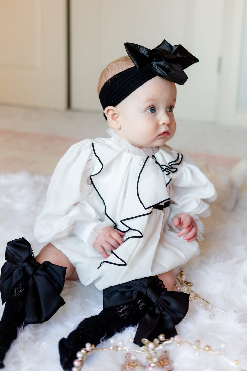 Customer photo review of Gwen White Romper with Black Ruffle Trim