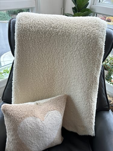 Customer photo review of Cream Solid Double Layered Print Throw