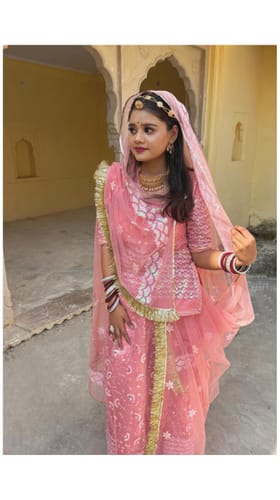 Customer photo review of Blushing Elegance: Pink Net Poshak with Sheer Net Odhna(Semi stich)
