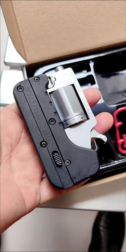 Customer photo review of Mini Switch Gun Cal 22 WMR Toy Gun
