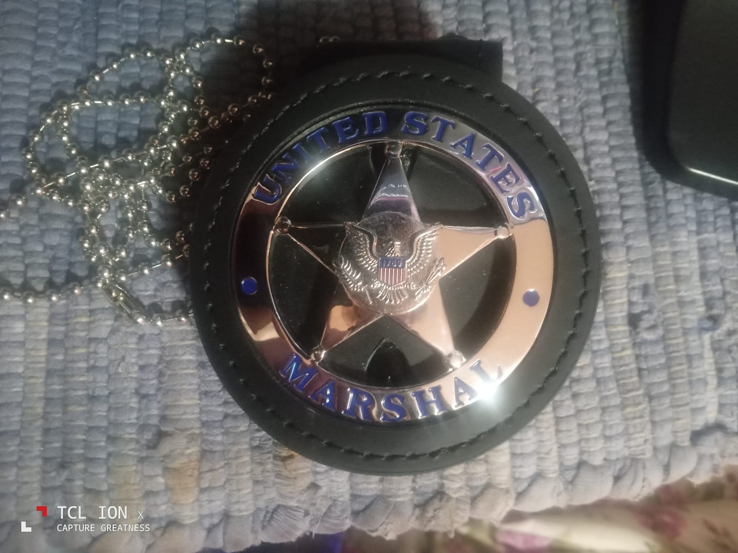Customer photo review of US Federal Court Law Enforcement MARSHAL Badge Solid Copper Replica Movie Props