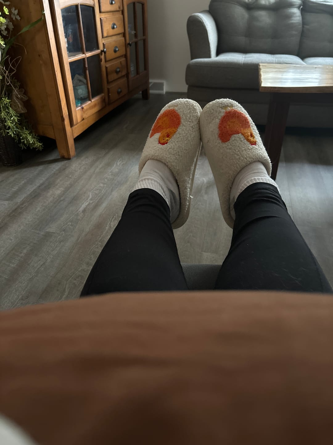 Customer photo review of Brown Fuzzy Chicken Slippers - Adult