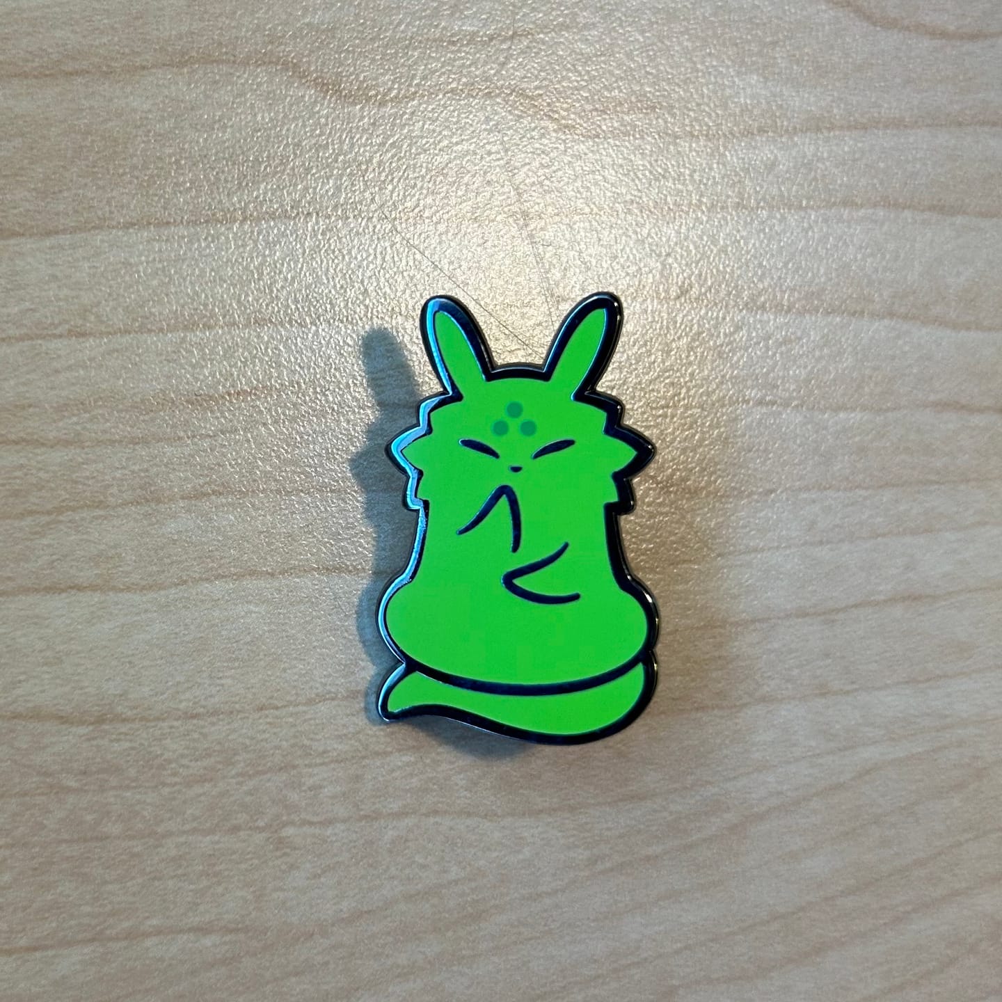 Customer photo review of Rain World - Saint Slugcat Pin