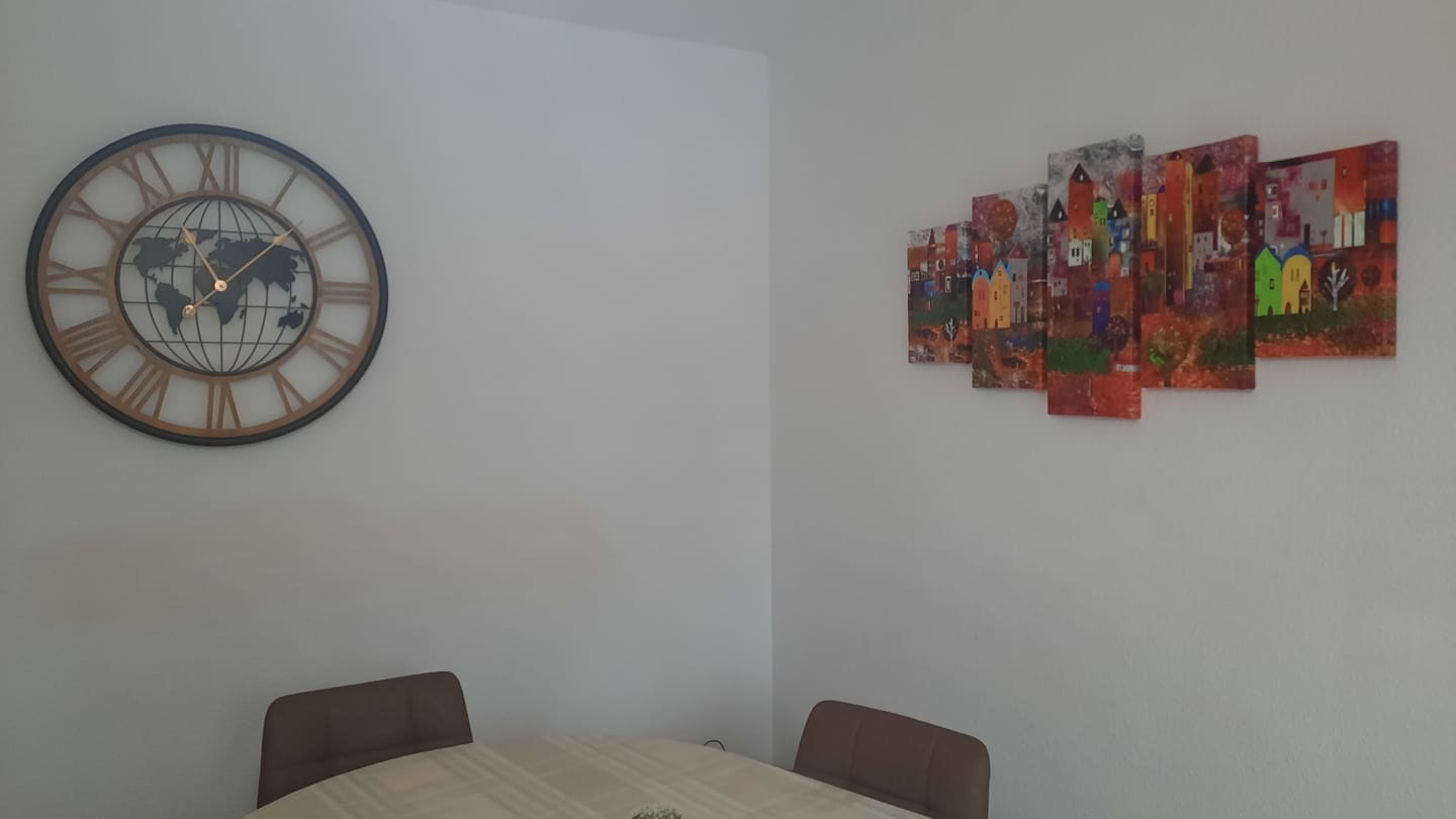 Customer photo review of Tableau Ville Abstraite Colorée