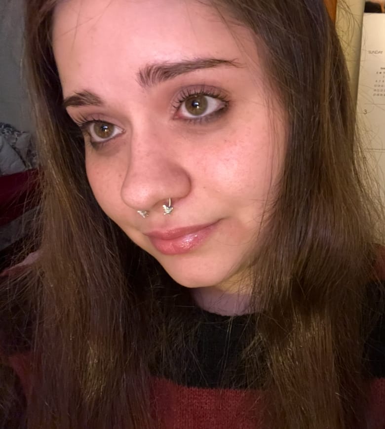 Customer photo review of 16G 3 Colors Fake Nose Ring Butterfly Magnet Septum Ring