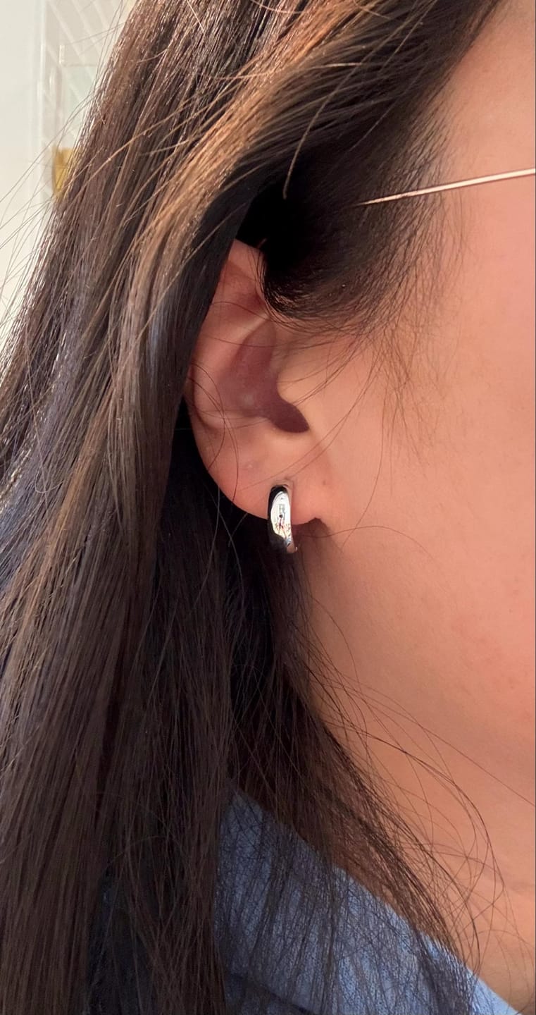 Customer photo review of Wide Dome Huggie Hoop Earrings, Solid 14K Gold