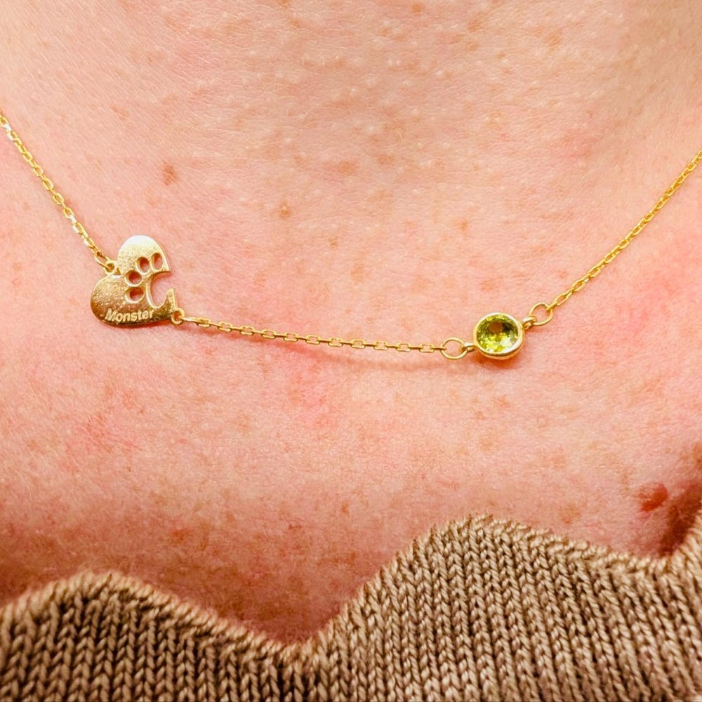 Customer photo review of Custom Engraved Paw Print Necklace