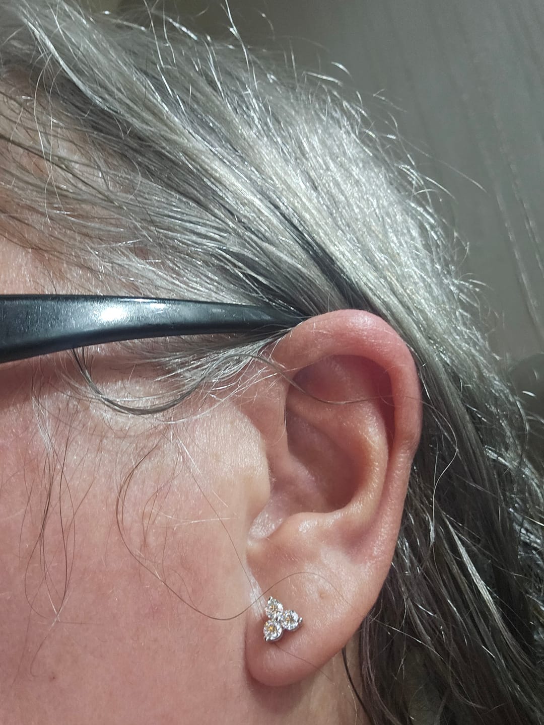 Customer photo review of Trinity Moissanite Sleep Stud Earrings