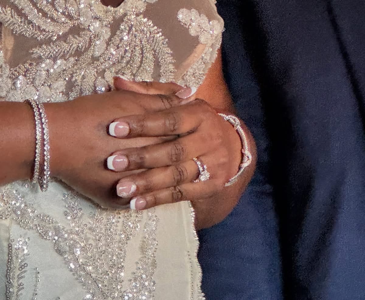 Customer photo review of Alternating Baguette and Round Moissanite Half Eternity Wedding Band