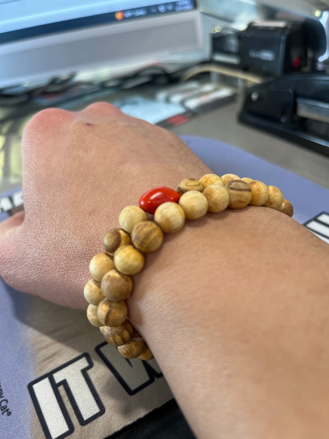 Customer photo review of Palo Santo and Huayruro Bracelet