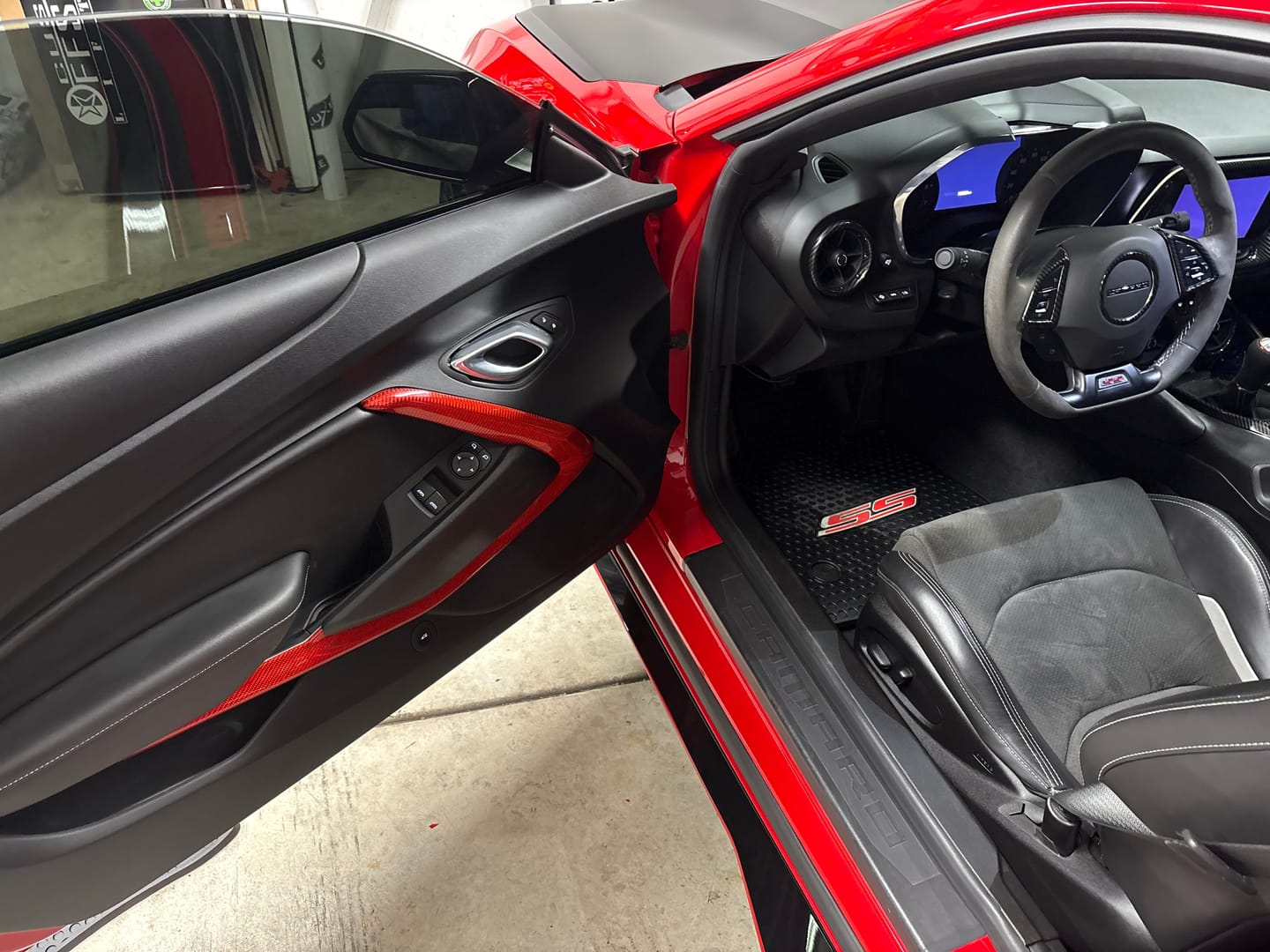 Customer photo review of 2016-2024 Camaro Real Carbon Fiber Interior Door Panel Chrome Trim Cover
