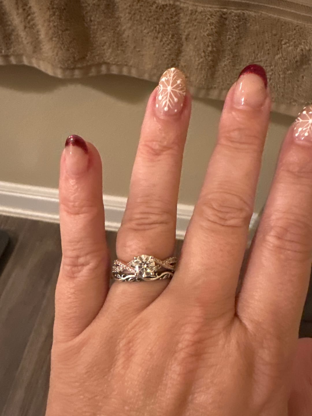 Customer photo review of Rose Gold Two Tone Moissanite Twisted Vine Pave Engagement Ring