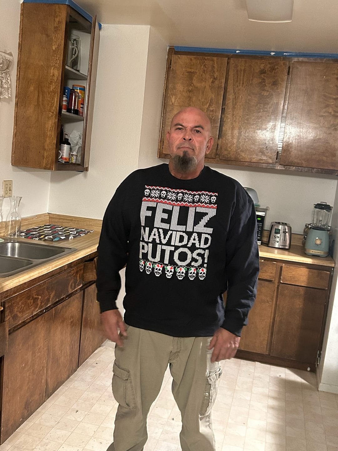 Customer photo review of Feliz Navidad Putos OG Navidad Sweatshirt