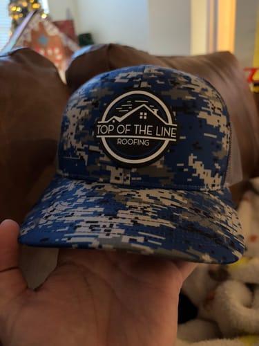 Customer photo review of Custom Leather Patch Trucker Hat - Richardson 112P