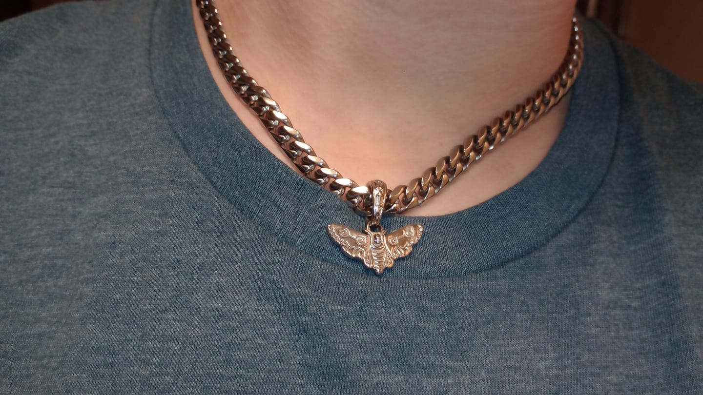 Customer photo review of MOTH PENDANT