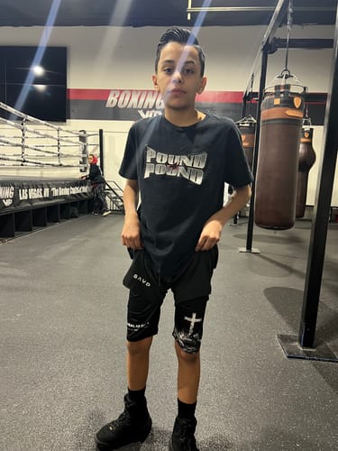 Customer photo review of Psalm 56:3 'Cross' Youth Performance Shorts