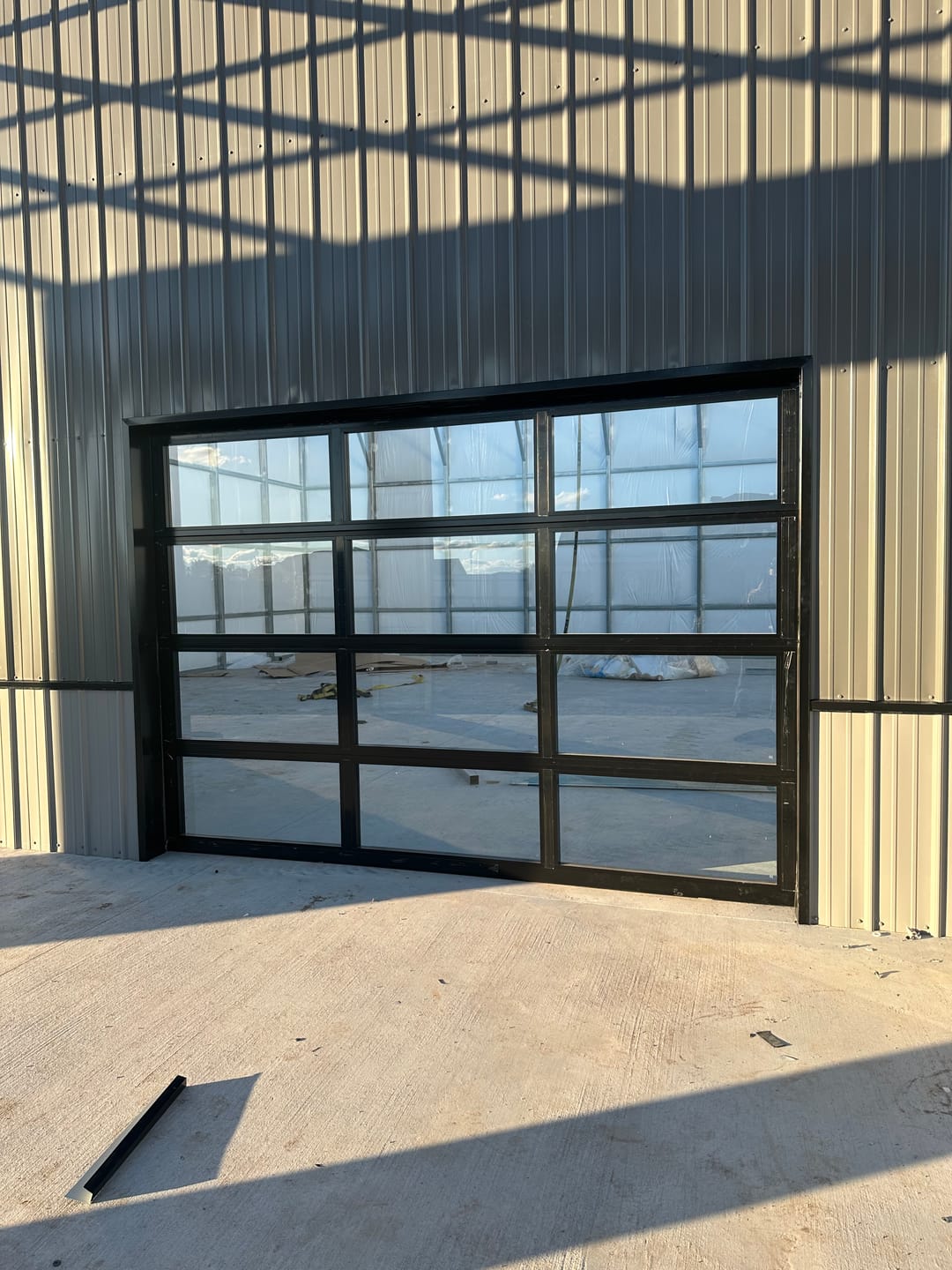 Customer photo review of 10 FT Wide By 7 FT Tall Full View Garage Door Matt Black Finish With Clear Glass